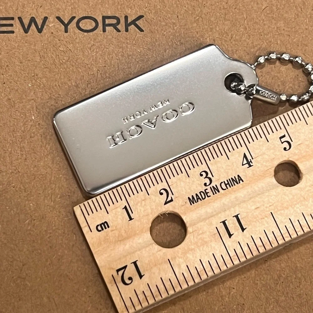 Coach Silver Engraved Dog Tag Keychain